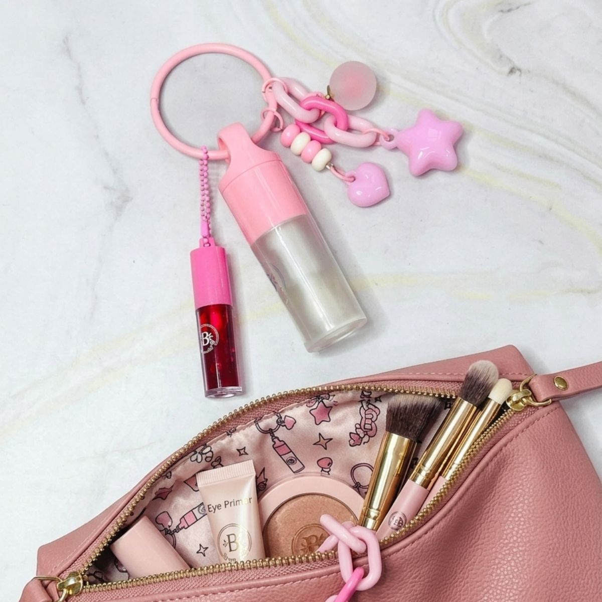 Gloss labial llavero Duo Bloom Bow Bloomshell set dos tonos moño decorativo beauty accesorio