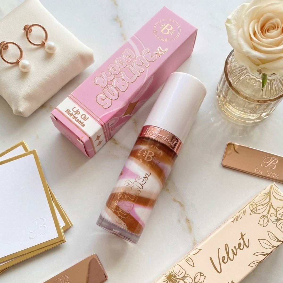 Lip Oil Bloom Sublime XL Bloomshell aceite labial hidratante brillo natural efecto volumen labios