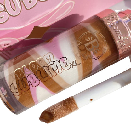 Lip Oil Bloom Sublime XL Bloomshell aceite labial hidratante brillo natural efecto volumen labios