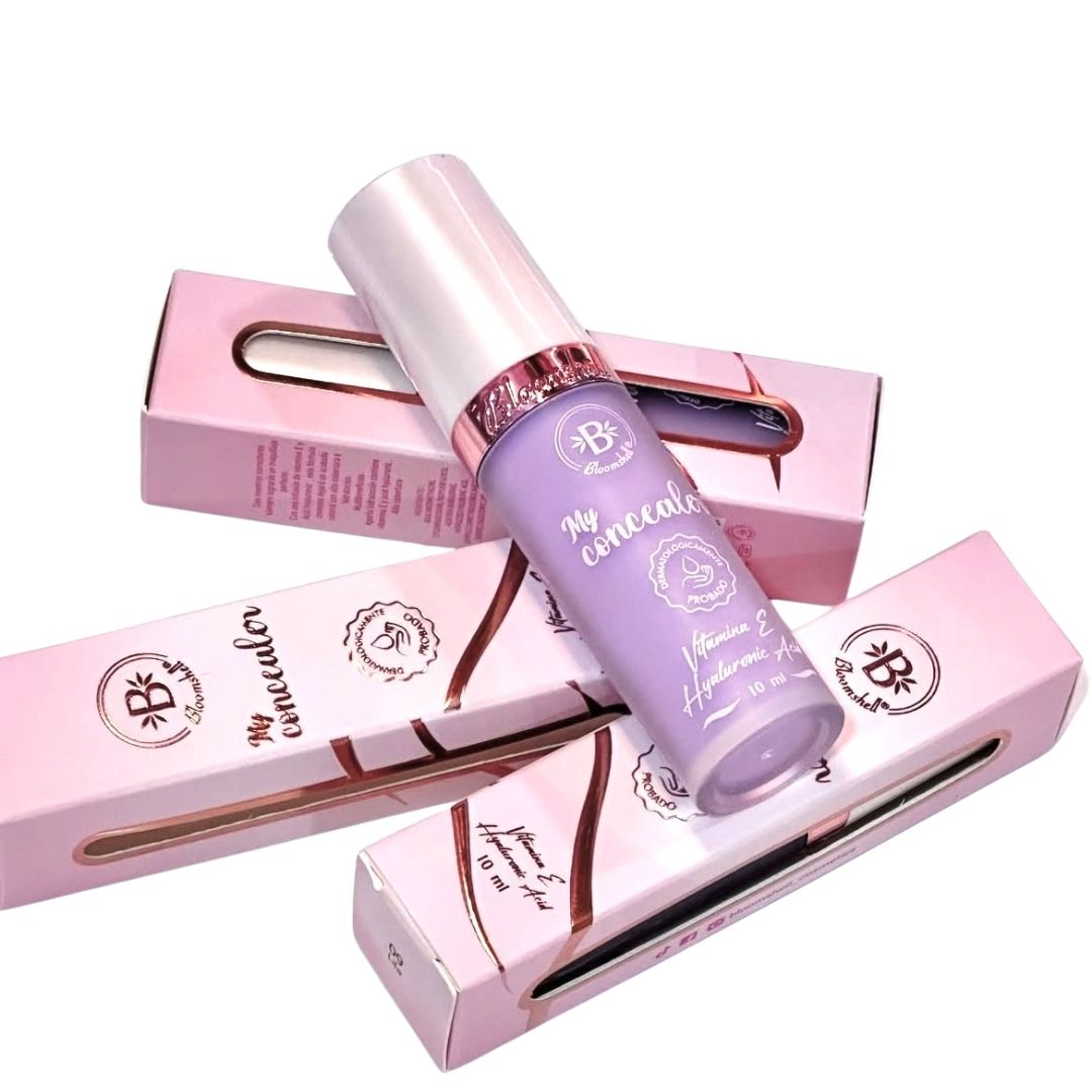 Corrector de ojeras en tono morado Bloomshell para neutralizar ojeras oscuras.